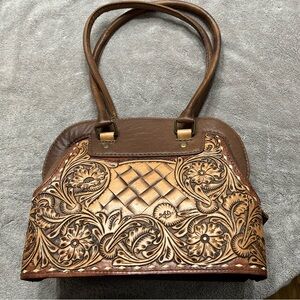 American Darling stachel with tooling on front